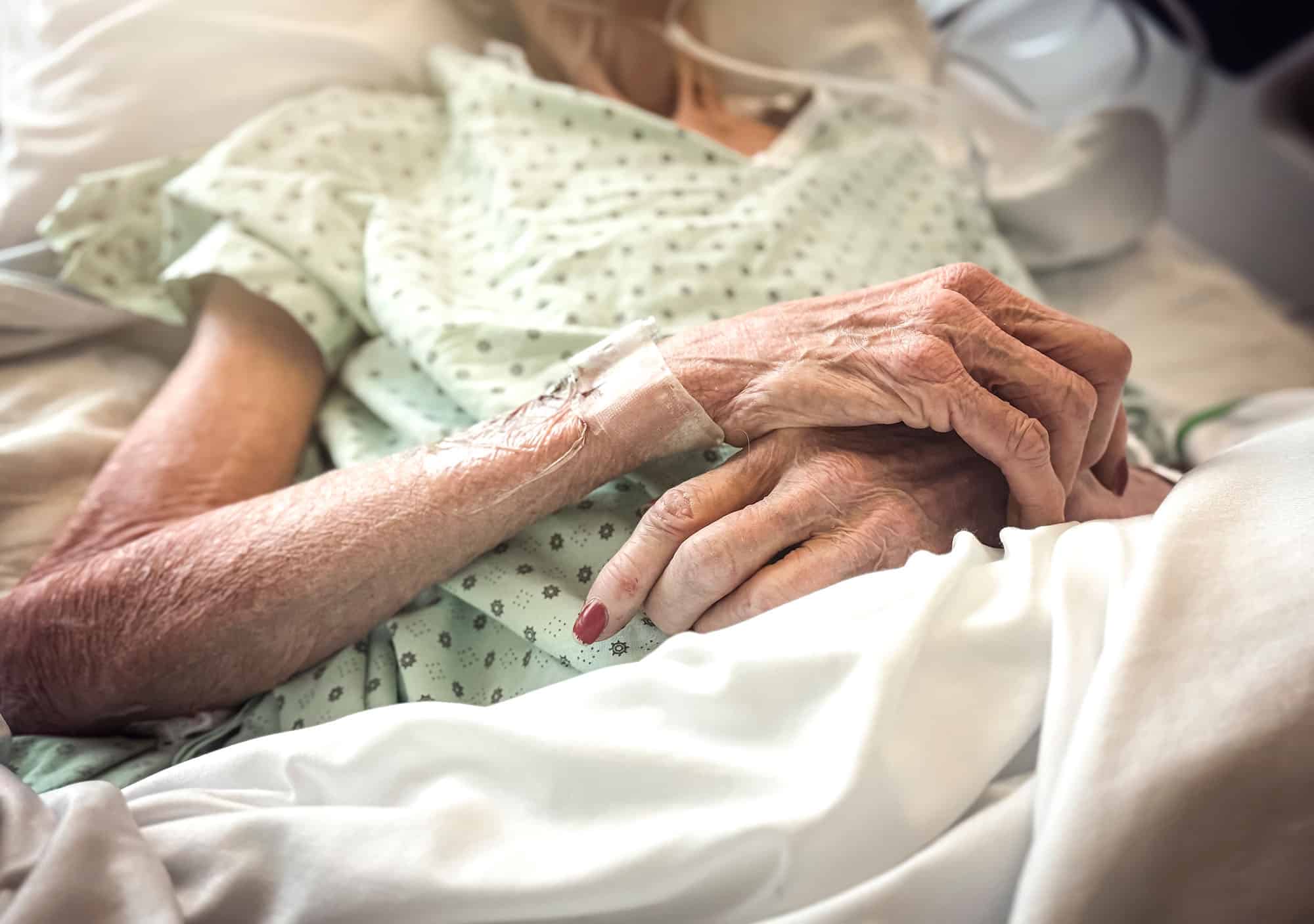 Elderley Woman in Care Hands
