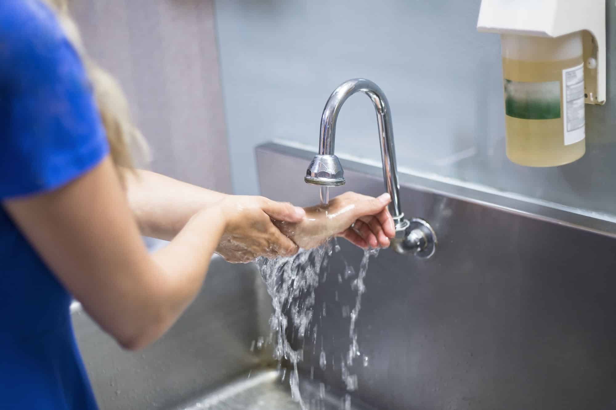 Female Nurse Washing Hands